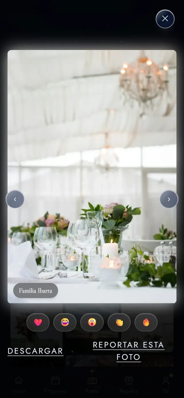 Una foto de la boda en el visor, con reacciones y el botón para descargar